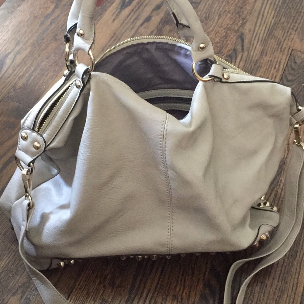 Cream shoulder bag with studded gold detail